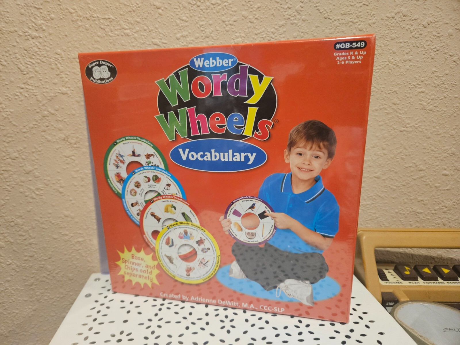 | Webber® Wordy Wheels® VOCABULARY GRADES K AND UP – 2-6 PLAYERS SUPER DUPER