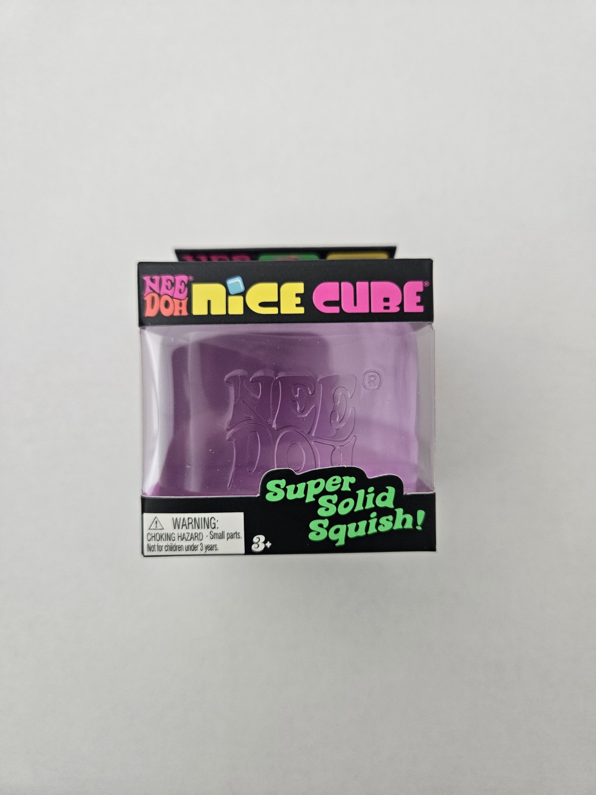 NeeDoh Nice Cube Swirl Purple Clear Nee Doh Super Solid Squish Cube – New