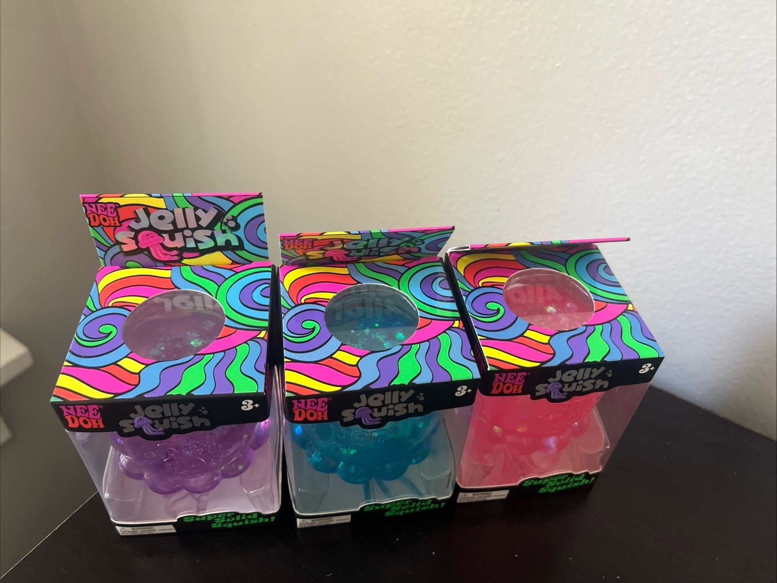 NeeDoh Nee Doh Jelly Squish Super Authentic Jelly Fish Lot Of 3 Pink Blue Purple