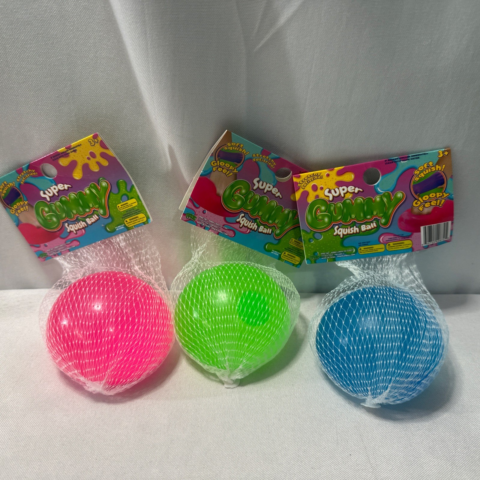 Set Of 3 Super Gummy Squish Ball 2.75″ Pink, Blue & Green – NEW