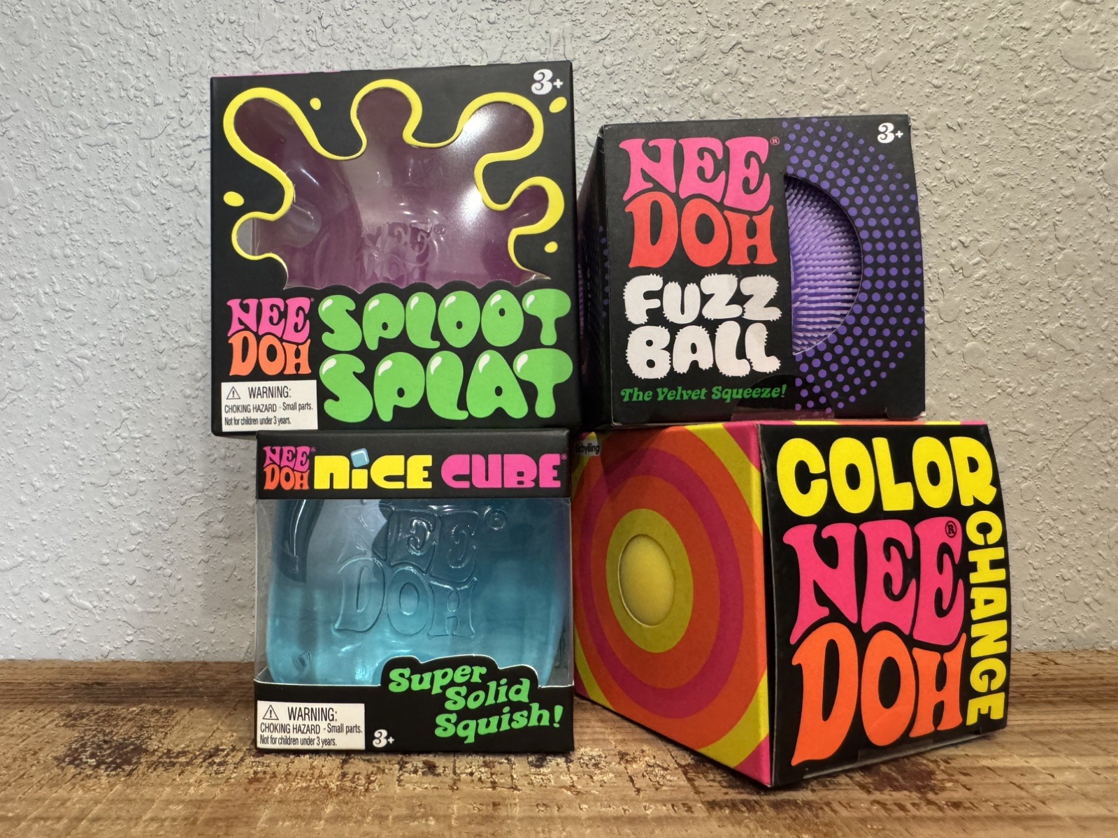 NeeDoh lot of 4 Sploot Splat, Fuzz Ball, Nice Cube and Color Changing Ball