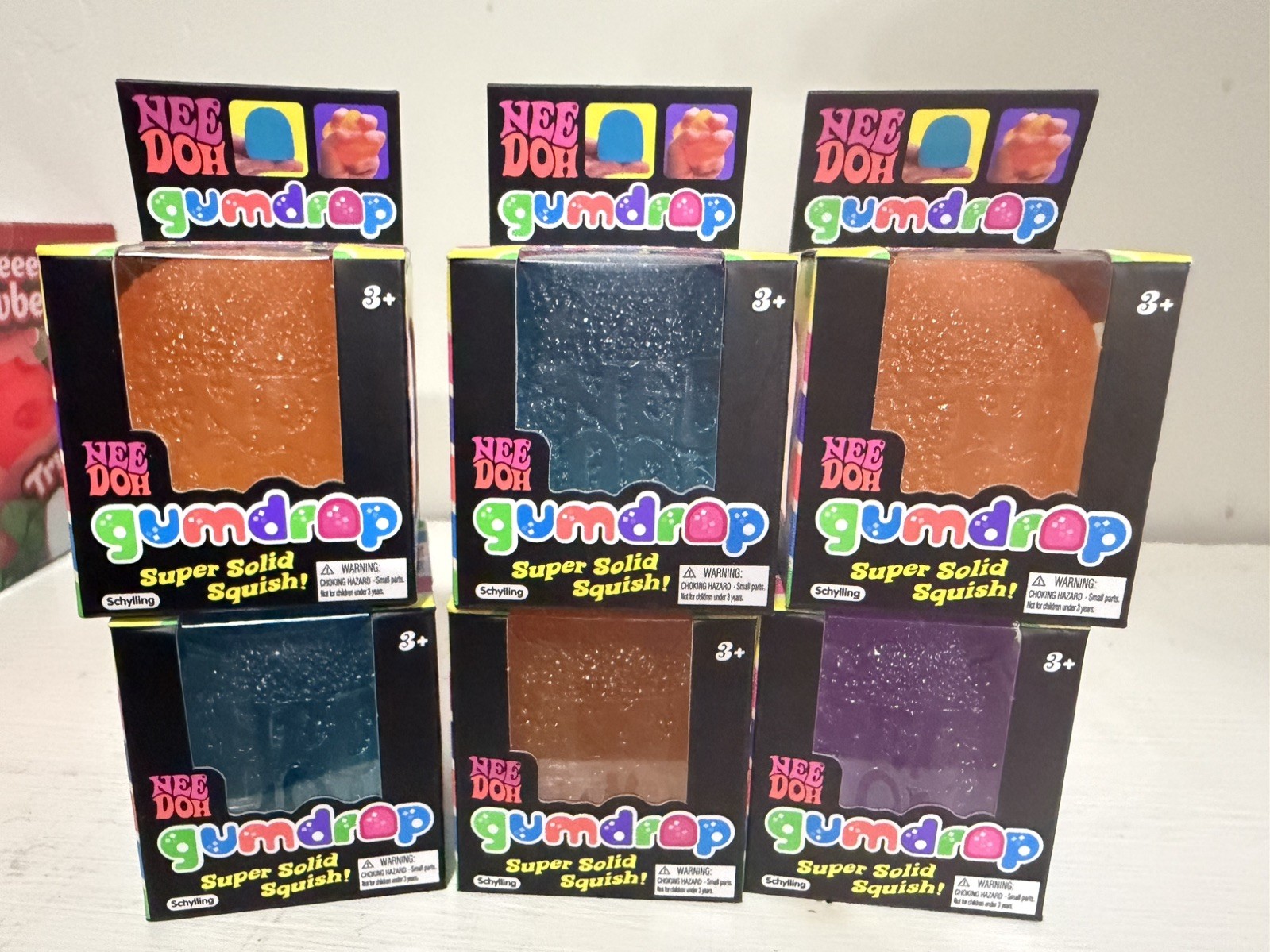Nee Doh Nice Cube Super Solid Gum Drop Set of 6- 3 Orange 2 Blue and 1 purple