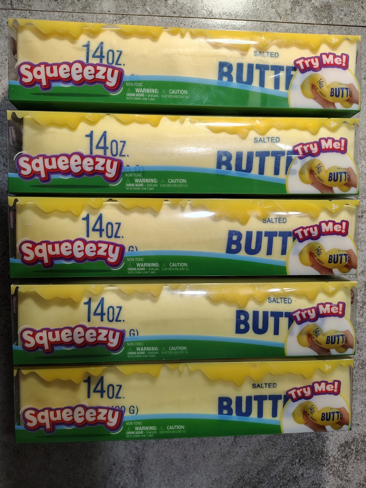 (LOT OF 5) SQUEEEZY 14OZ. BUTTER SQUISHY BRAND NEW FACTORY SEALED