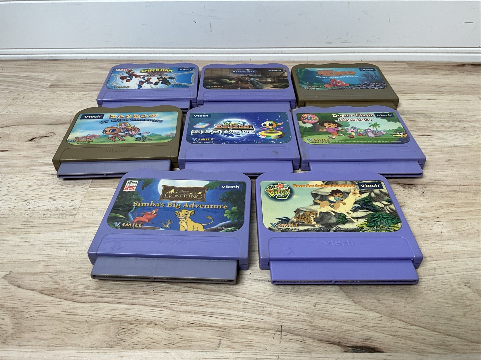 Lot of 8 V tech V Smile Cartridge Games Disney Lion King, Spider-Man, Remy, Dora
