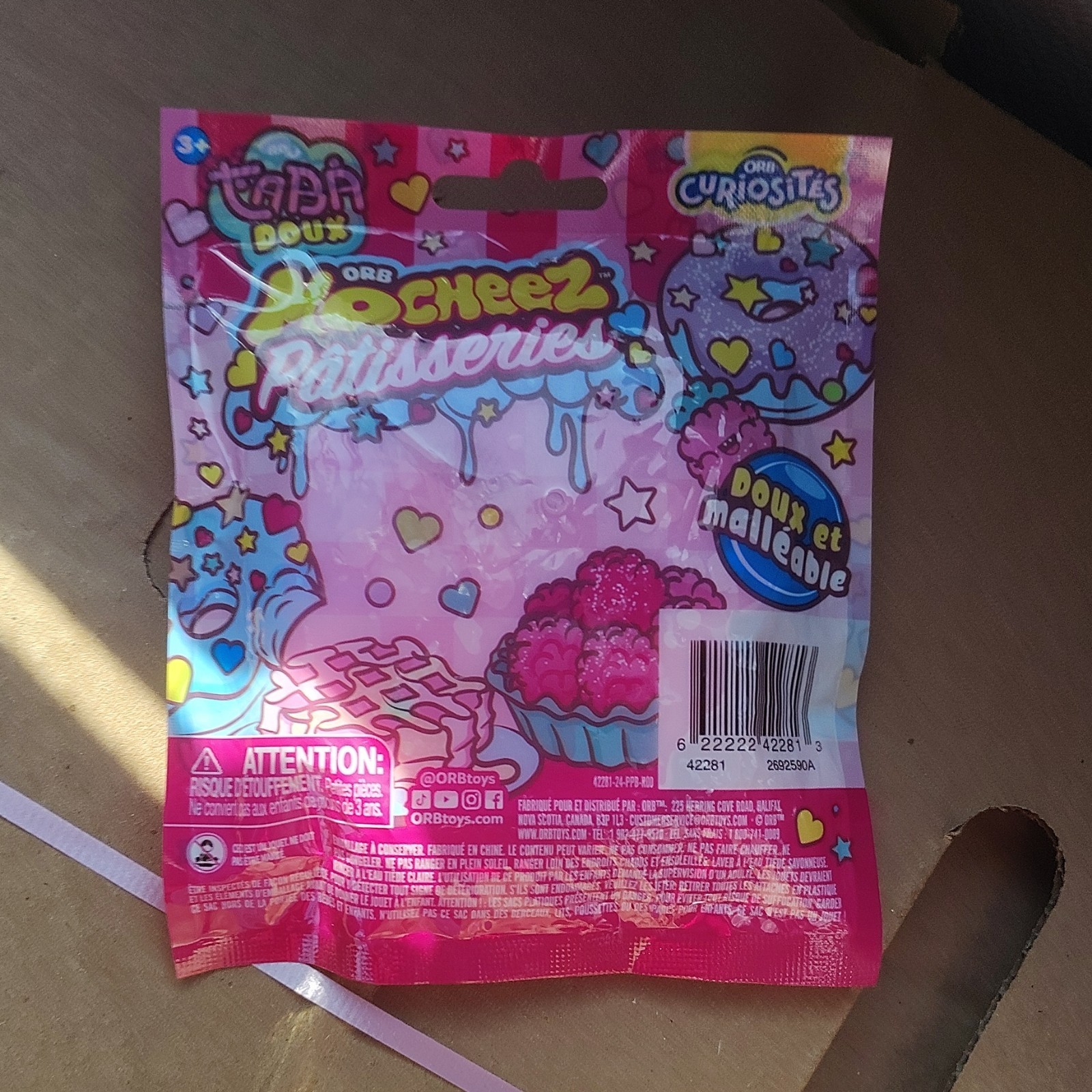 ORB MoCheez Bakery Soft & Squeezy Tactile Toy, Pink/Multicolor, 2023