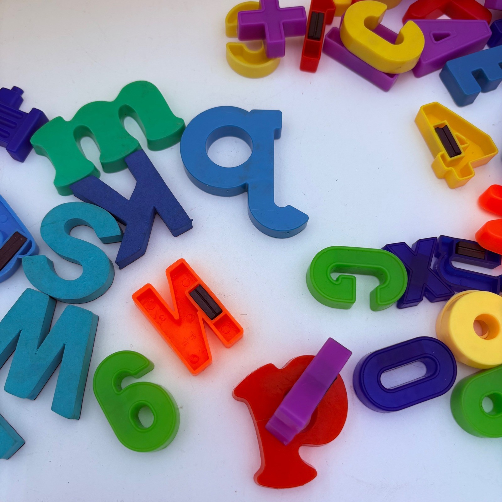 Magnetic letters, numbers, symbols, huge lot, 3 lbs. in plastic bin plastic foam