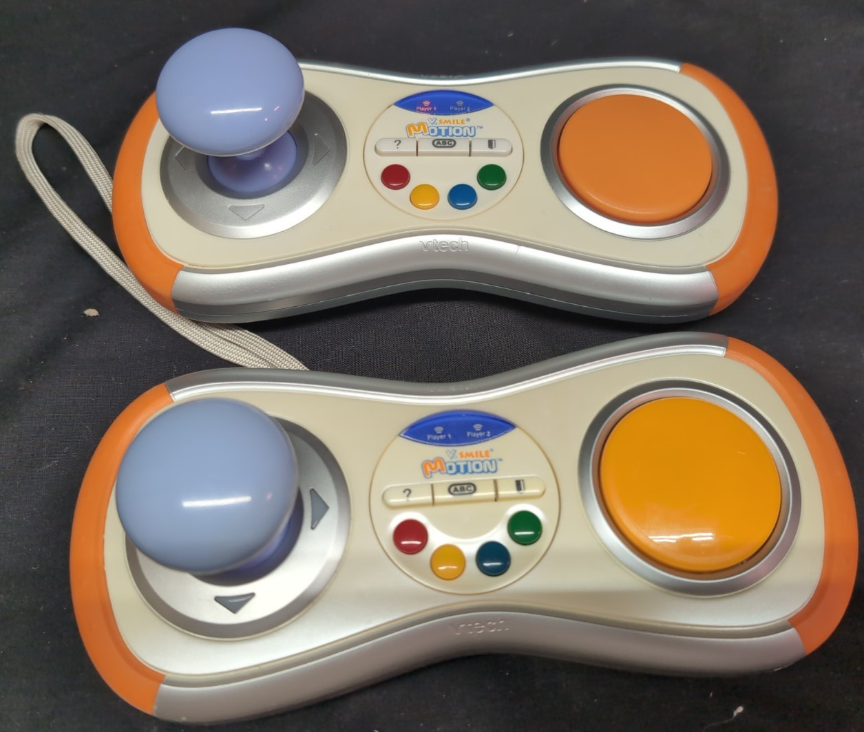 Vtech V.Smile V-Motion Active Learning System Console with 4 Games 2 Controllers