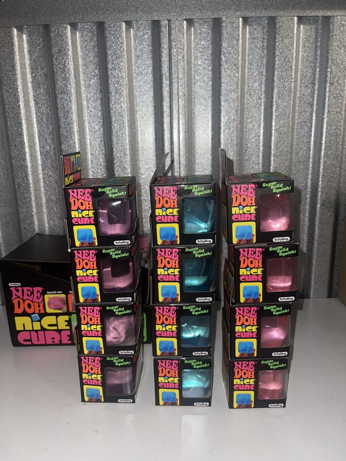 Lot Of (12) – Full Case NeeDoh Nice Cube Display – All 3 Colors
