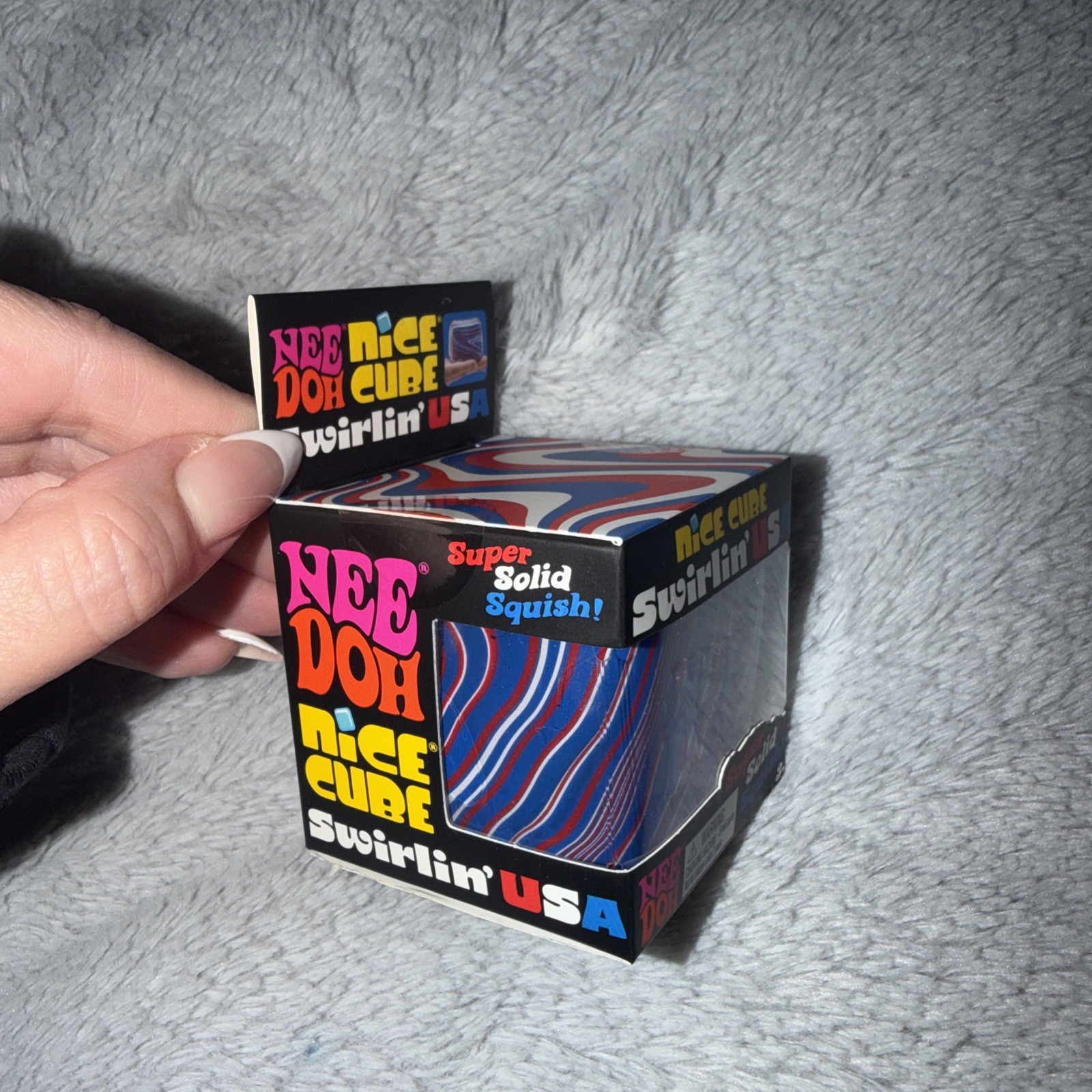 Nee Doh Nice Cube Swirlin’ USA Super Solid Squish Toy Blue Red White Squishy