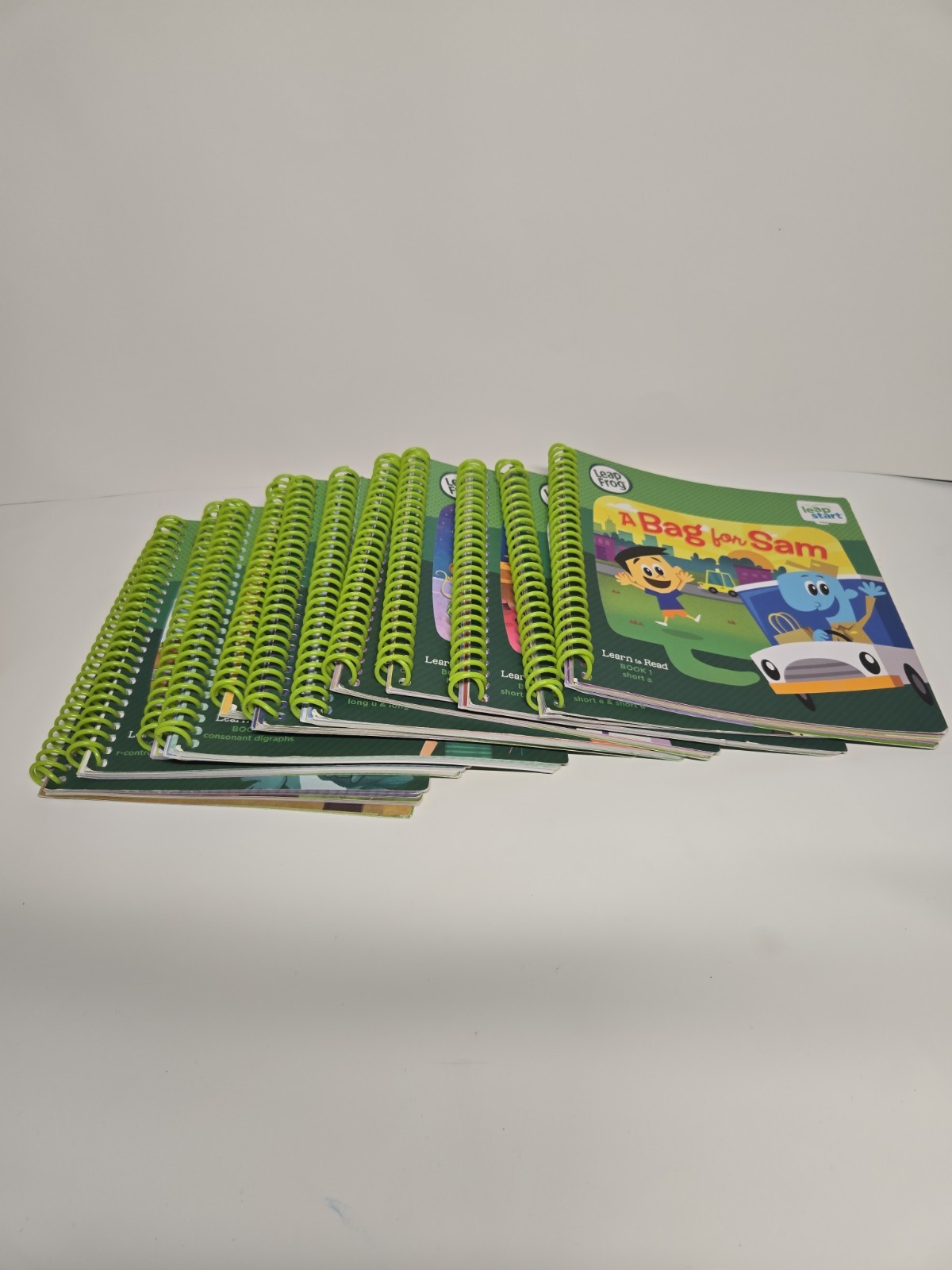 Lot Of Twelve (12) Leap Frog Learn To Read Sprial Books Use