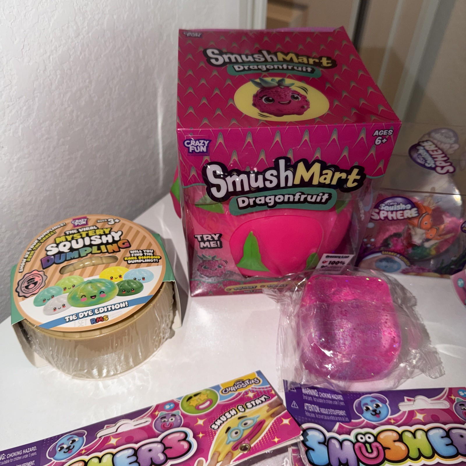 (7 Piece Bundle) Smushers Smushmart Dragonfruit rms Dumpling Orb Squish Ball