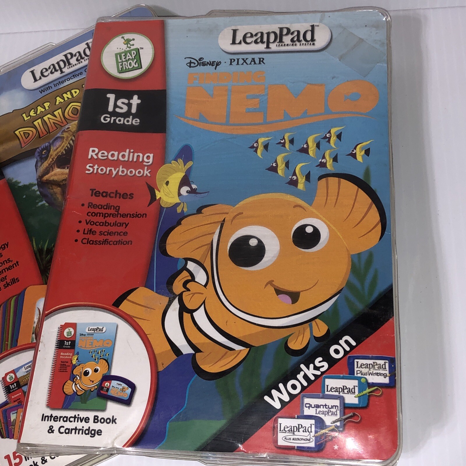 Lot Of 2 LeapFrog LeapPad Leap and the Lost Dinosaur Finding Nemo 1st Grade/115j