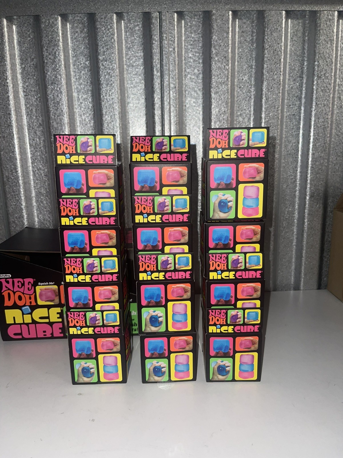 Lot Of (12) – Full Case NeeDoh Nice Cube Display – All 3 Colors