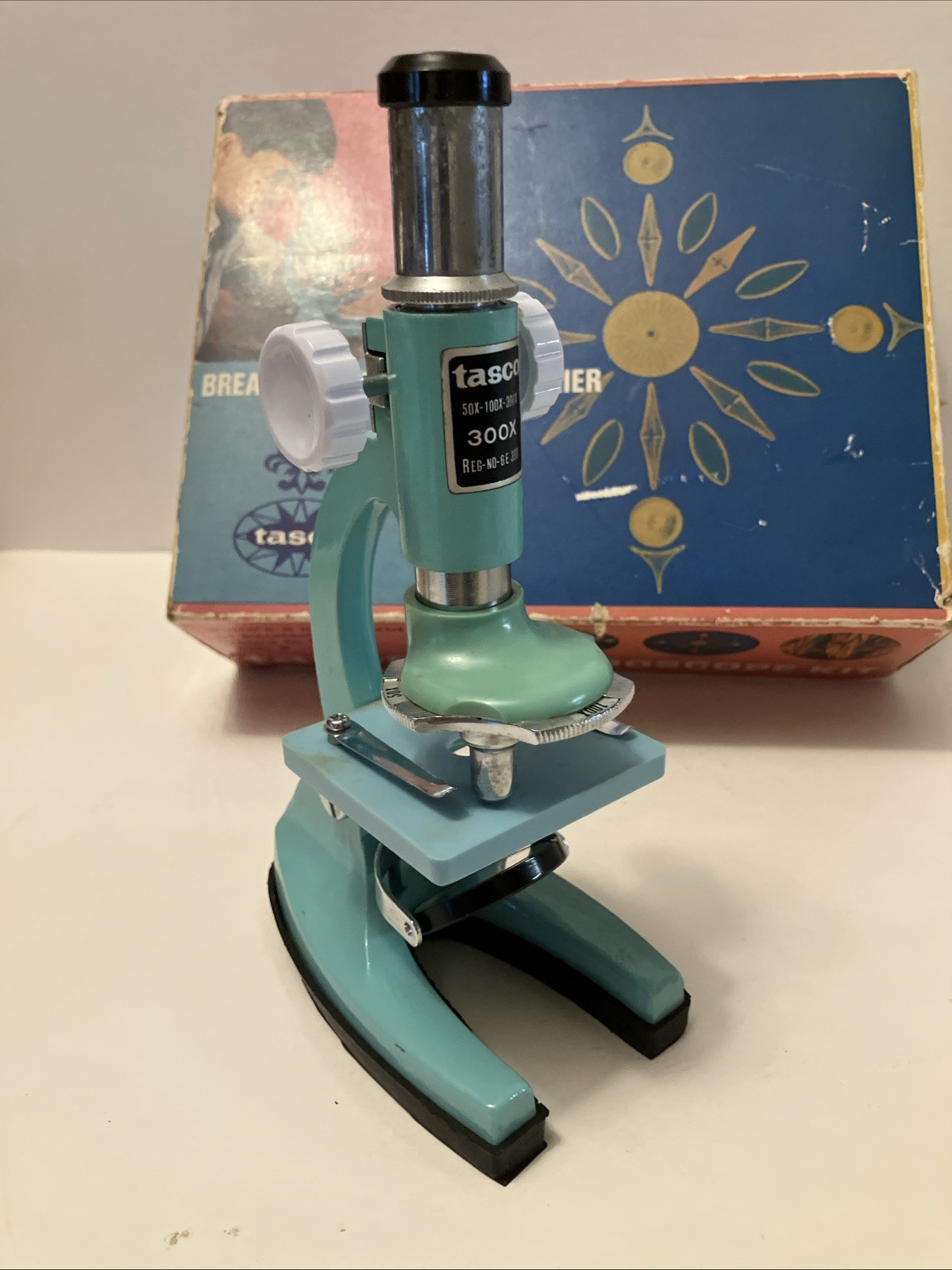 1960’s-70’s ear TASCO #991 Junior 50x, 100x, 300x turquoise microscope in box