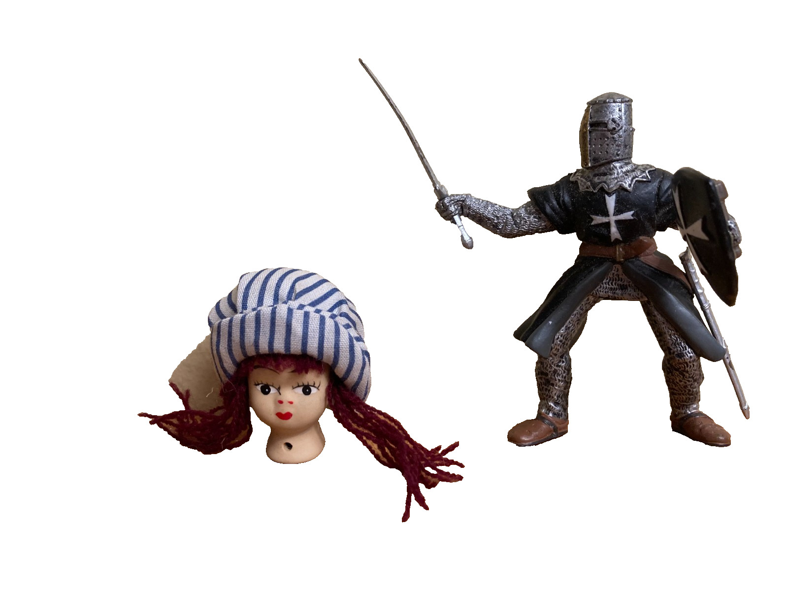 Dozen sand tray figure miniatures address ideas of childhood, danger, and safety