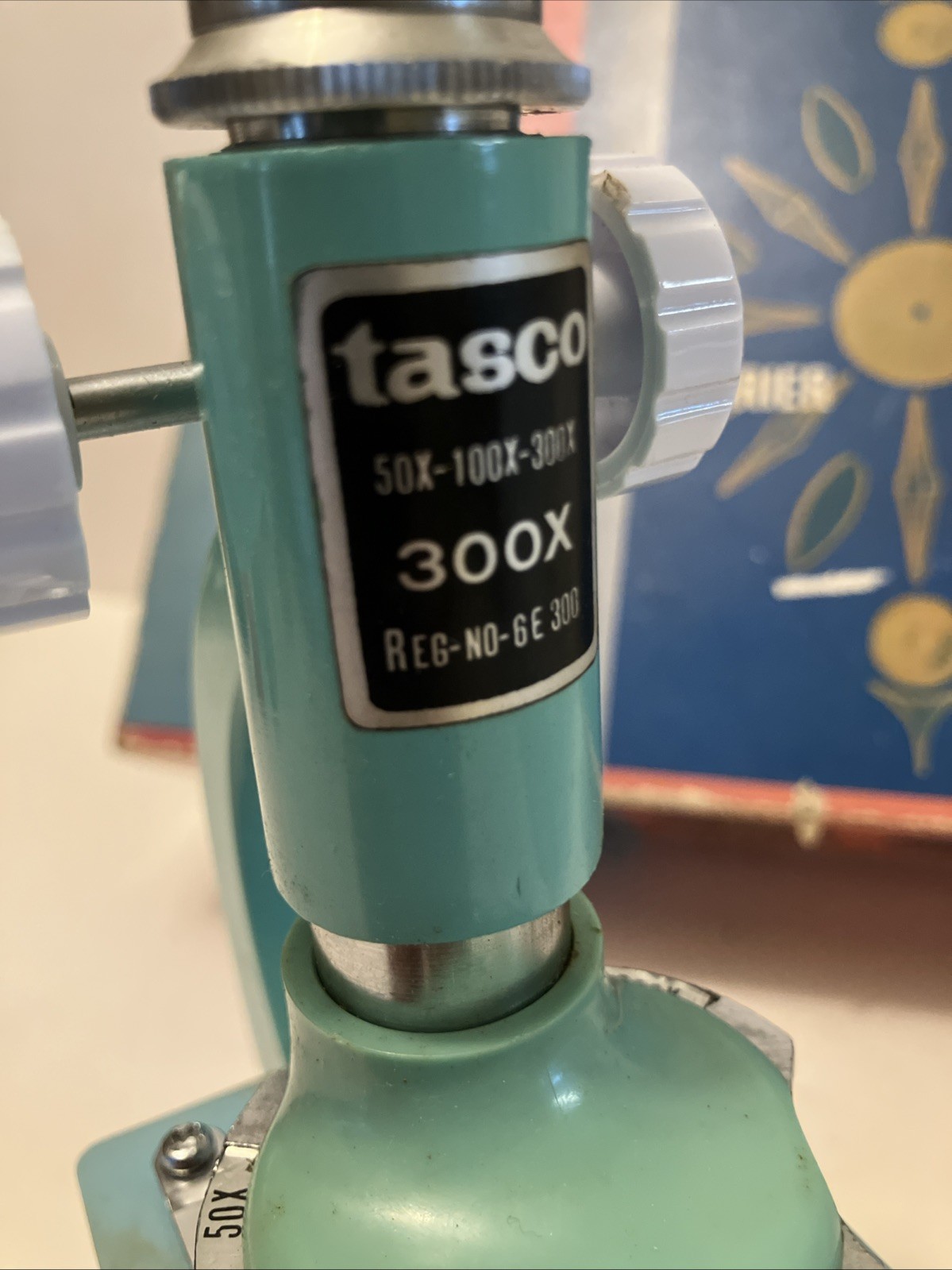 1960’s-70’s ear TASCO #991 Junior 50x, 100x, 300x turquoise microscope in box
