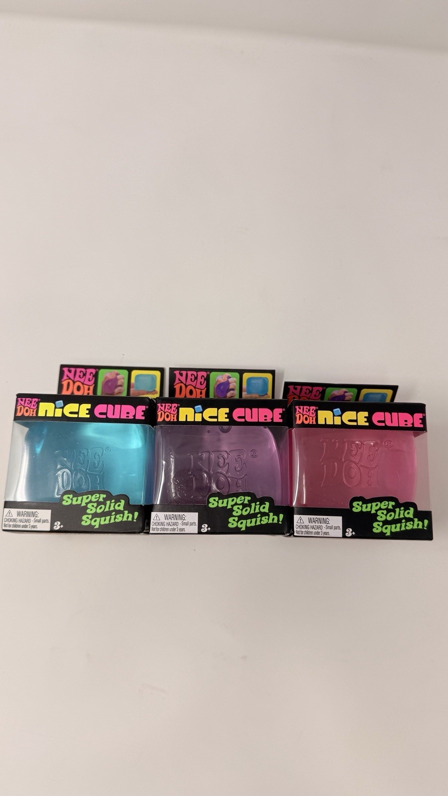 NeeDoh Nice Cube 3 Super Solid Squish Fidget Toy Pink/Blue/Purple – 3 PACK