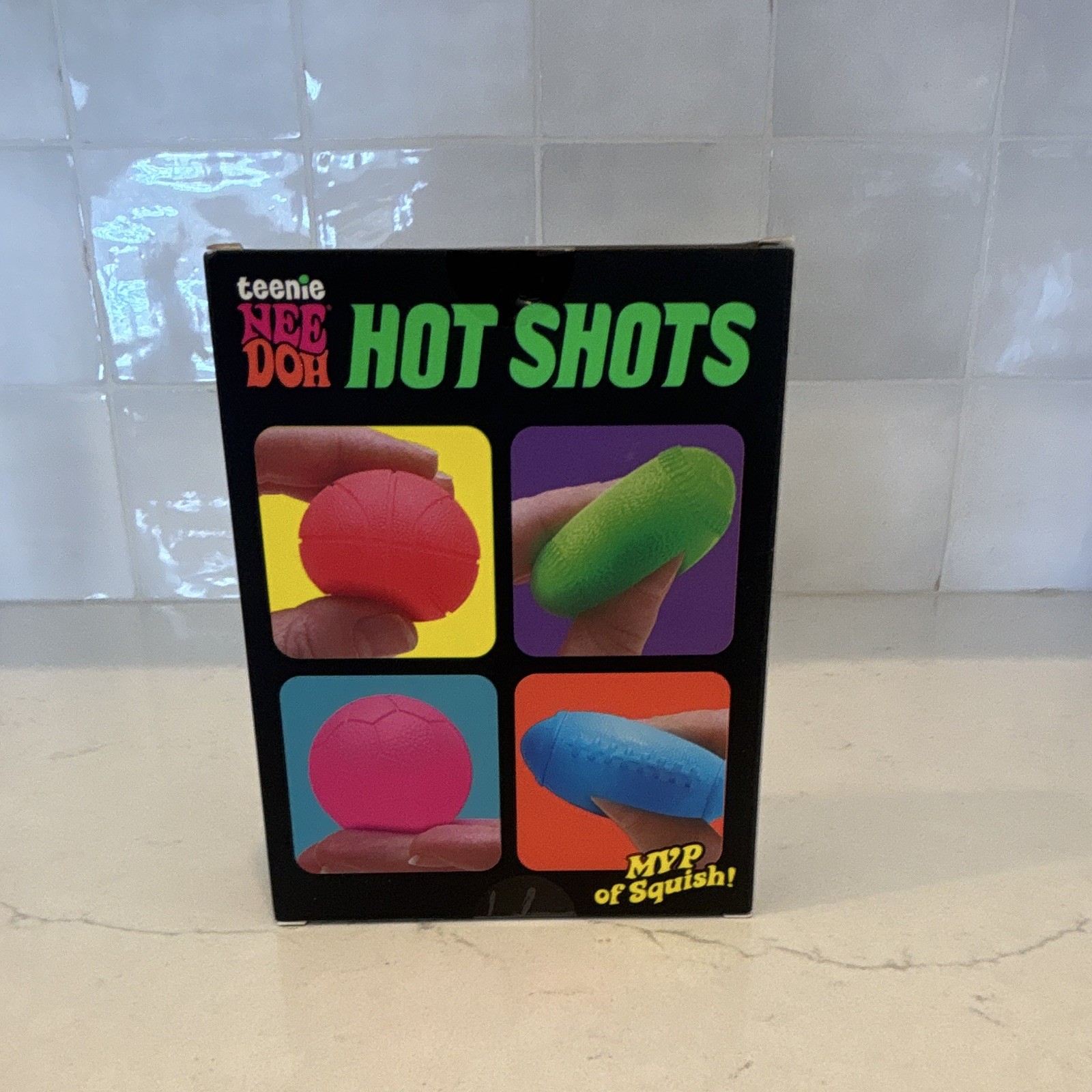 Nee Doh Hot Shots Teenie Set of 4 Squishy Squeeze Balls, Multicolor