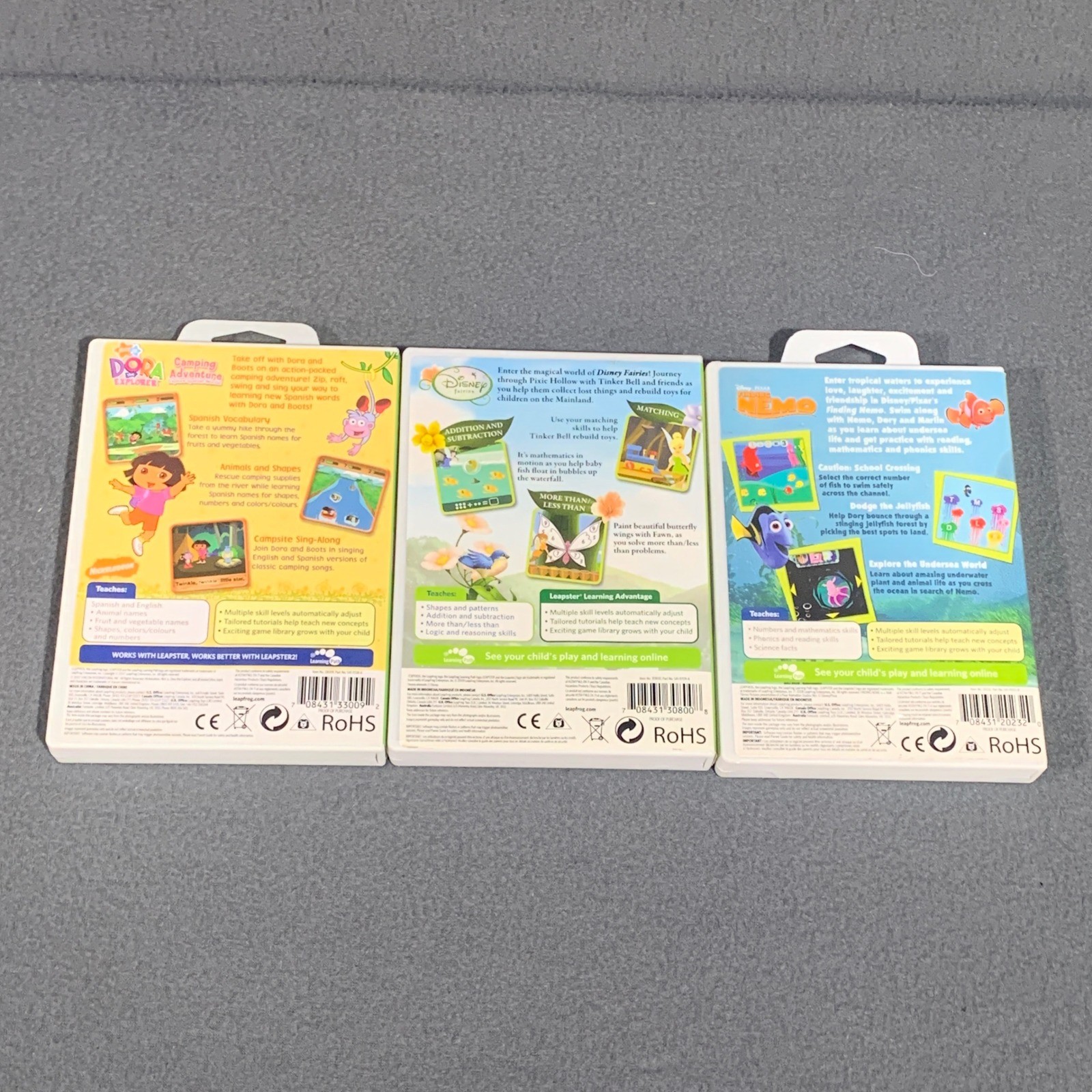 LeapFrog Leapster Games Lot of 3 Finding Nemo Disney Fairies Dora Explorer Case