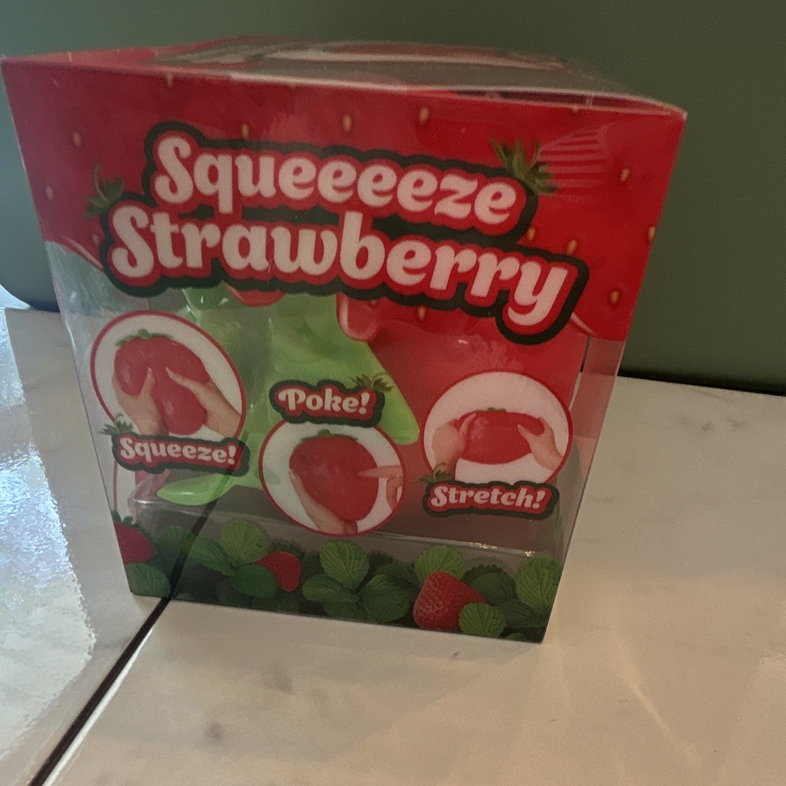 Sunny Days Squeeeeze Strawberry Gel Tactile Squeeze Toy Red/Green Squishy