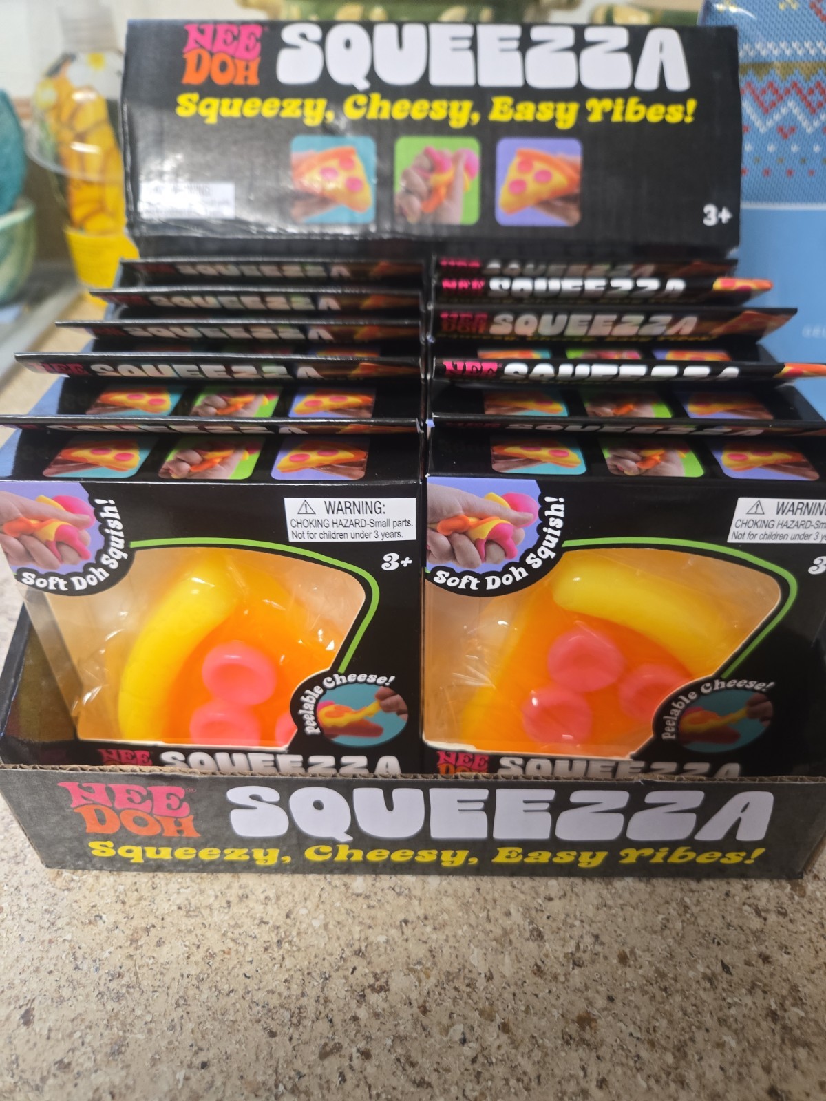 X-10 NeeDoh SQUEEZZA Pizza Slice Squishy Toy With Display Case