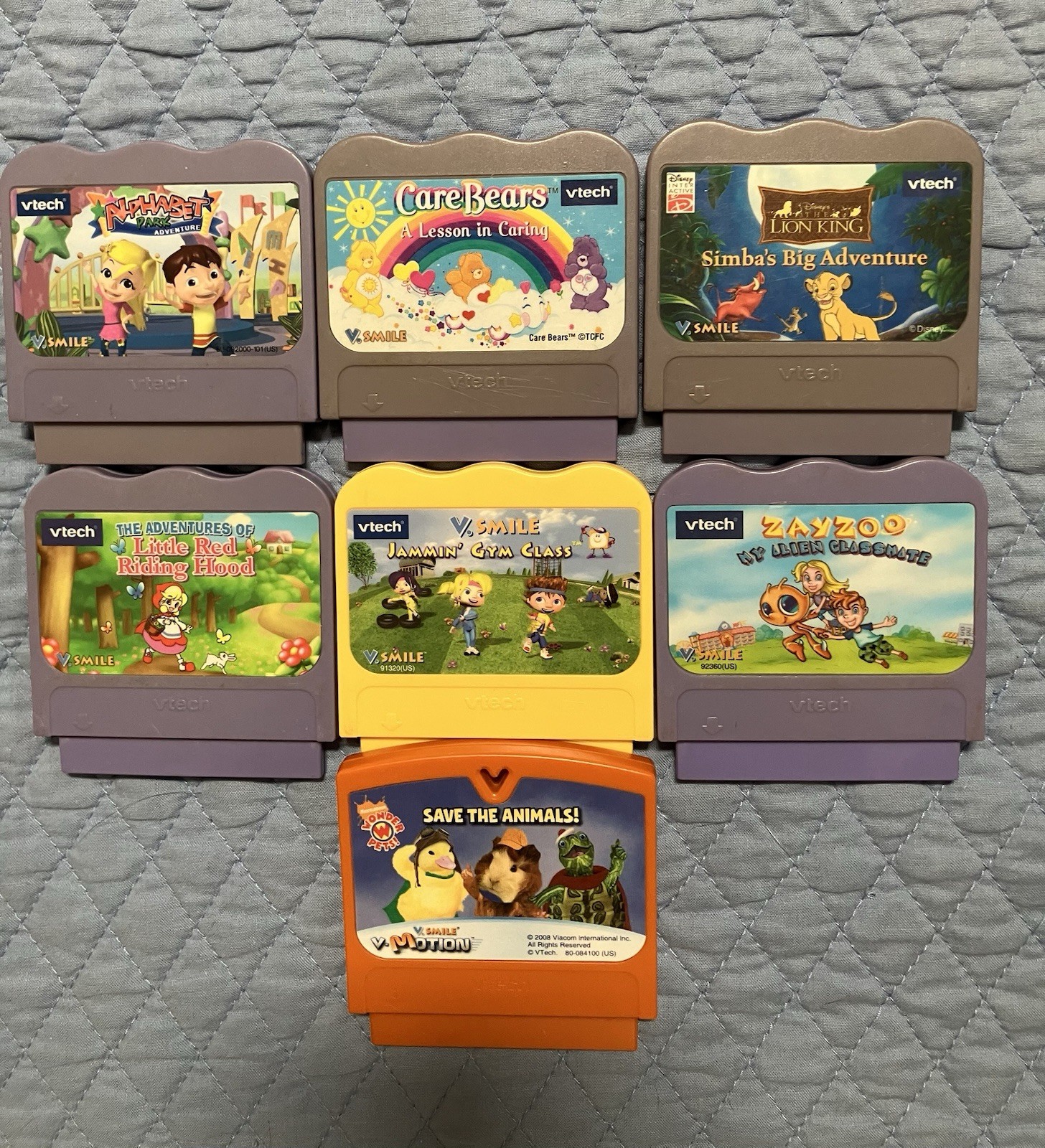 Lot of 7 V.Tech V.Smile Games Cartridges Care Bears, Lion King, Alphabet Park