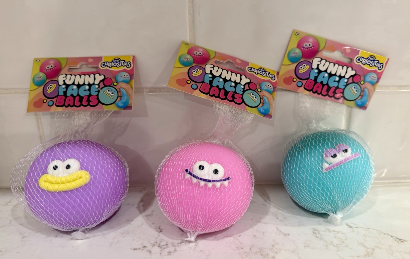 Orb Curiosities Funny Face Balls Squishy (Purple, Teal, Pink) Viral – Set Of 3