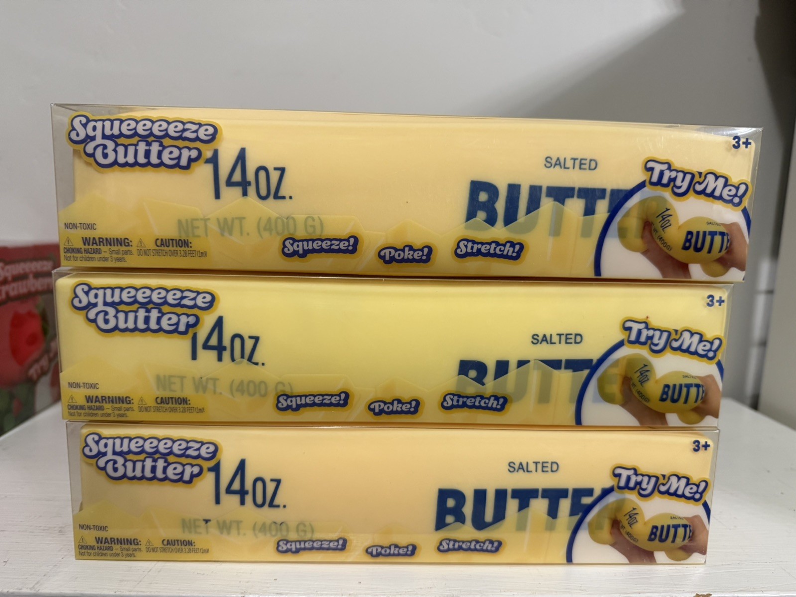 Case of 6 toymendous jumbo squishy butter in display case.