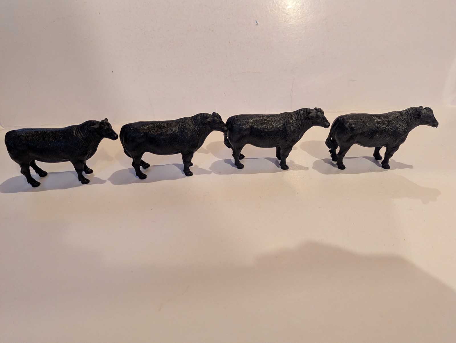 Lot of 4 New Ray Black Angus Cows (3 5/8″)