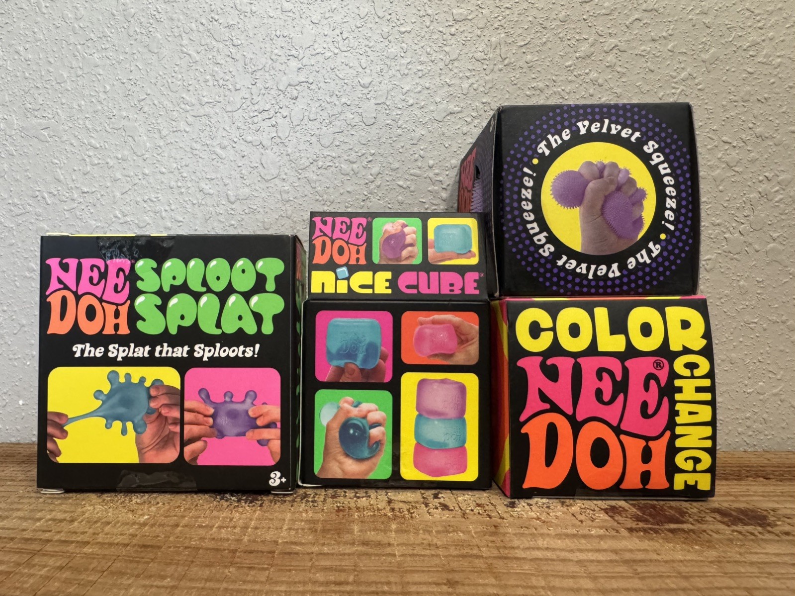 NeeDoh lot of 4 Sploot Splat, Fuzz Ball, Nice Cube and Color Changing Ball