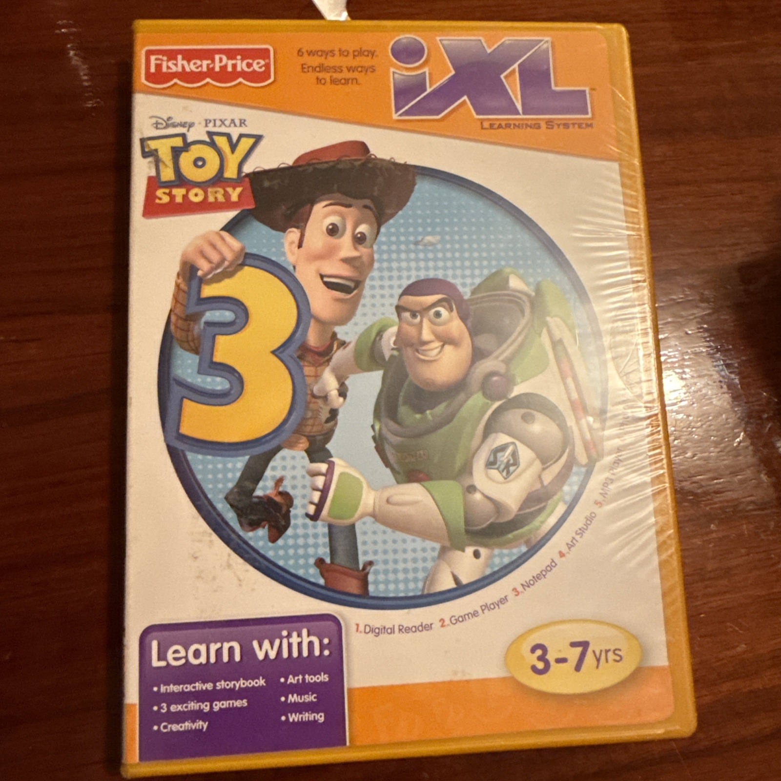 Fisher-Price iXL -Learning System. Toy Story 3 Ages 3-7 6 Ways to play