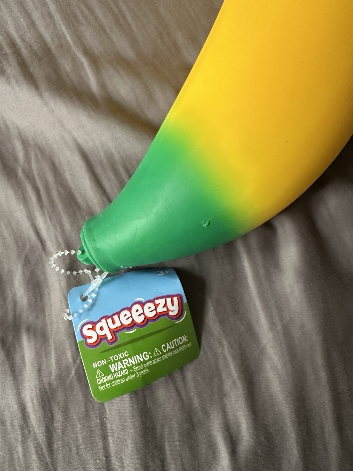 Sunny Days Squeezy Squishy Stretchy Banana NEW FAST SHIP