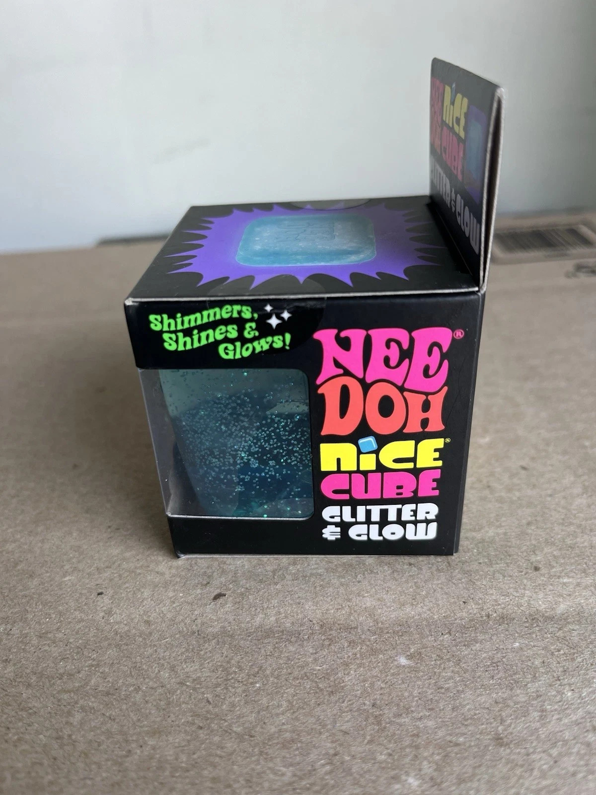 NeeDoh Nice Cube Glitter and Glow Nee Doh Squishy Glowing Ice Schilling Toy BLUE