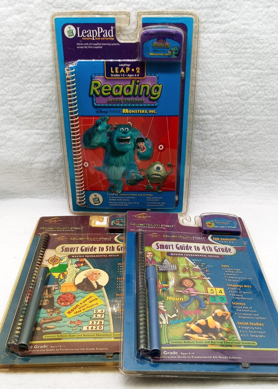 Quantum Leap Quantum Pad and a Leap Frog Lot of 3 Books Cartridges Ages 6-11