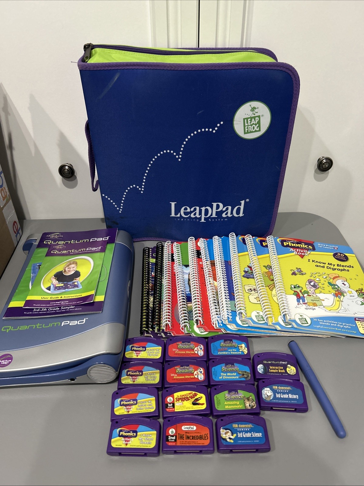 Leapfrog Quantum Pad Learning System 10 Books 14 Cartridges PK-3rd Tested Works!